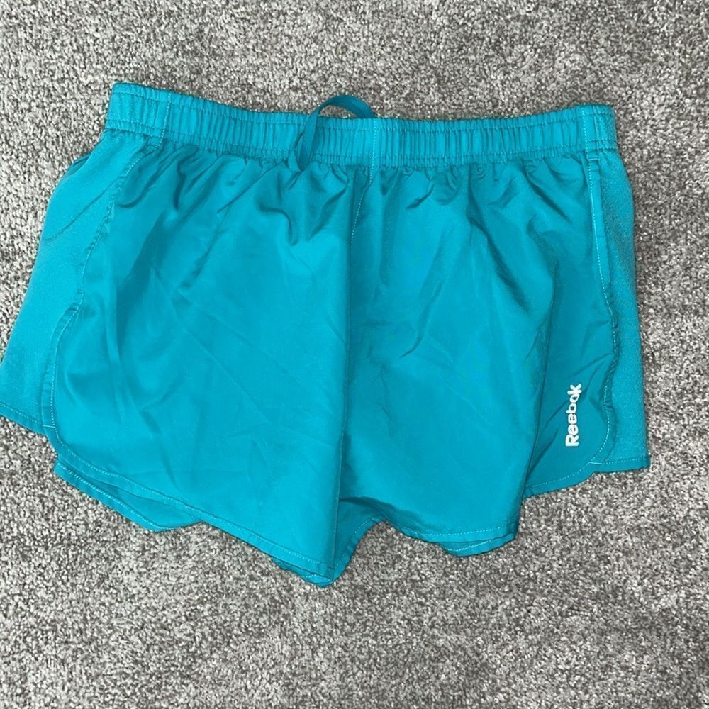 Reebok athletic running work out lined women’s shorts M Green reflective